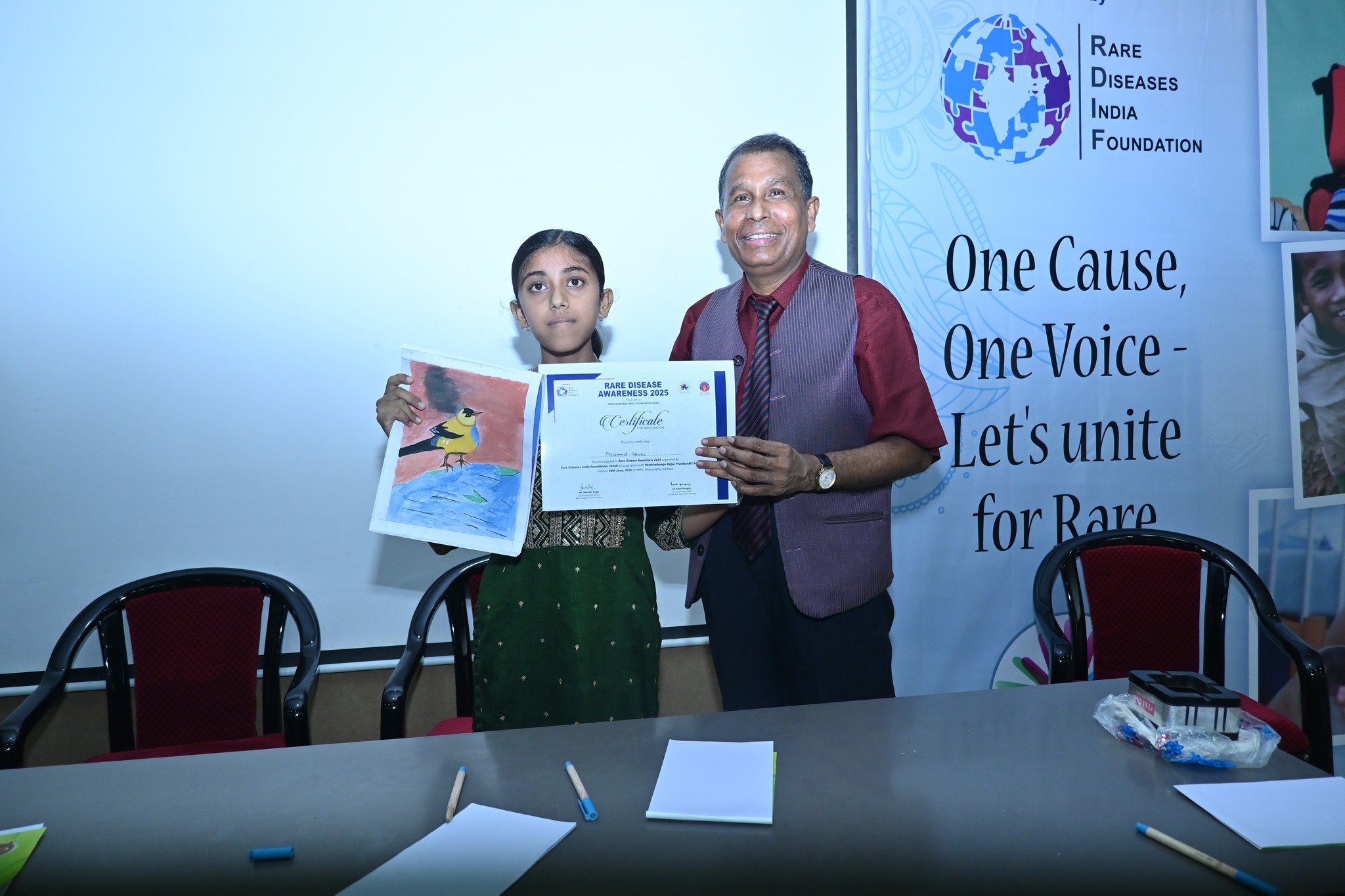 Media partners interviewing an event organizer.